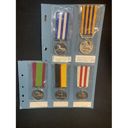 725 - A display of 5 Full size metal retrospective copies of Military Campaign Medals