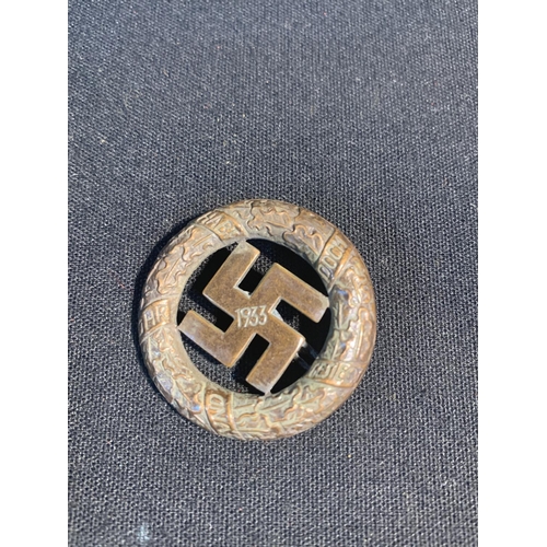 726 - A 1933 Stamped Nazi brass/bronze party badge reverse stamped Deschler and Sohn Munich (possibly late... 