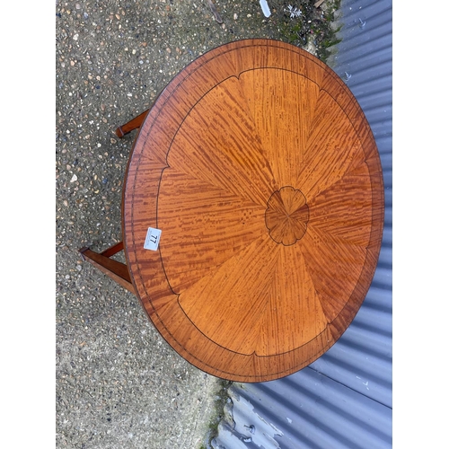 77 - A circular inlaid satinwood occasional table