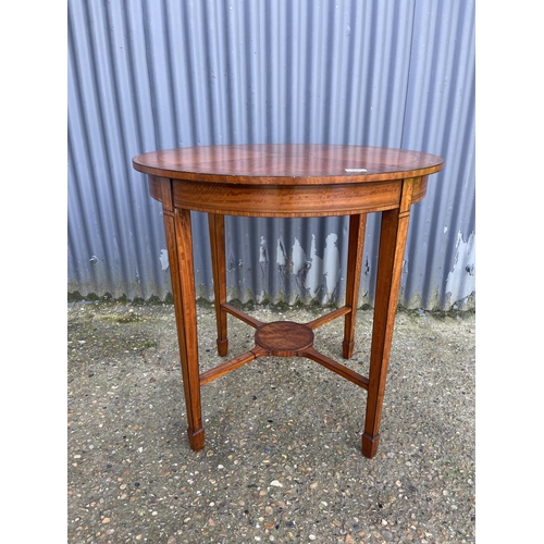 77 - A circular inlaid satinwood occasional table