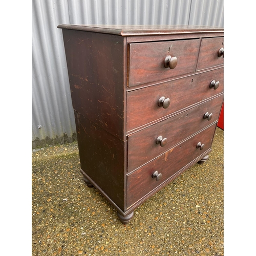 8 - A victorian mahogany two section chest of five drawers
