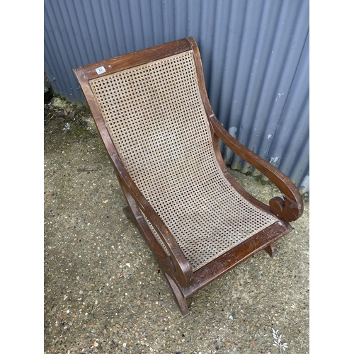 83 - A continental style begere slipper chair