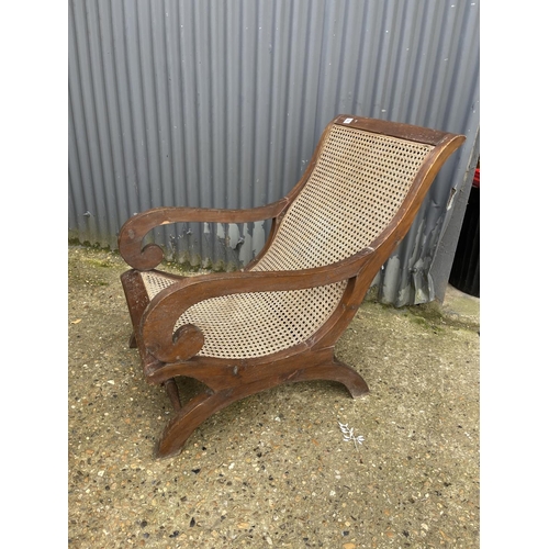 83 - A continental style begere slipper chair