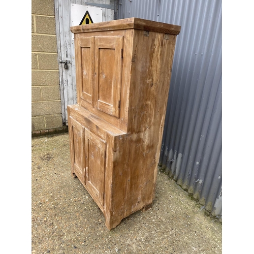 86 - A rustic antique pine larder cupboard with shelves to the interior