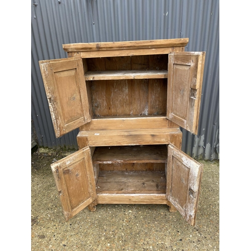 86 - A rustic antique pine larder cupboard with shelves to the interior