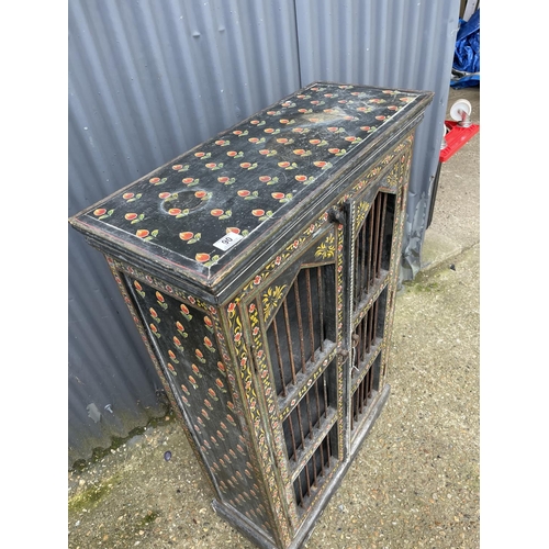 89 - A painted cabinet with metal grill front