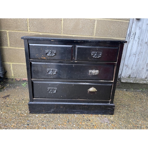 9 - An Edwardian black painted chest of four drawers