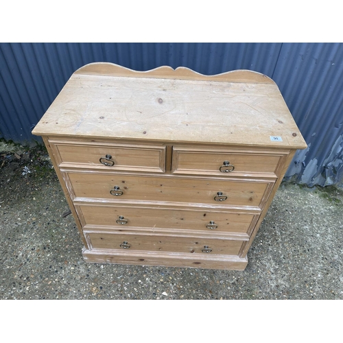 90 - A pine chest of five drawers