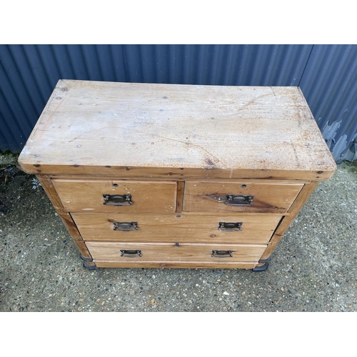 91 - A satinwood chest of four drawers