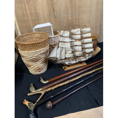 953 - Collection of walking sticks, baskets and galleon