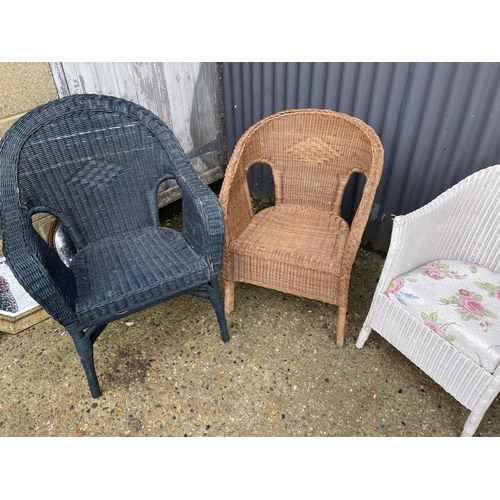 96 - Two Lloyd loom chairs and two wicker chairs