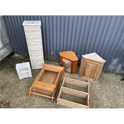 97 - Painted chest of drawers, two corner cabinets, two wall shelves and a white cupboard