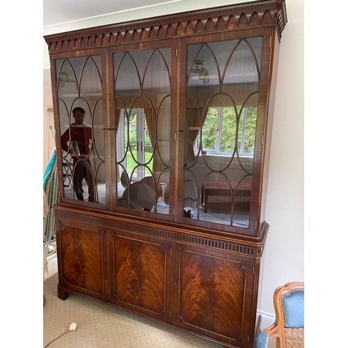 380 - A large reproduction mahogany glazed bookcase cupboard