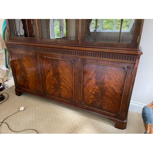 380 - A large reproduction mahogany glazed bookcase cupboard