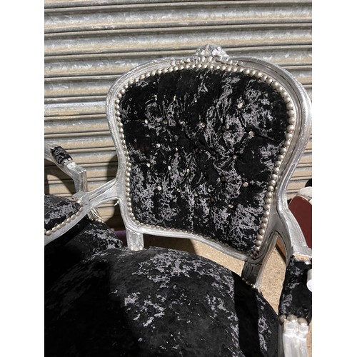 63 - A pair of black crush velvet, silver gilt and diamanté throne style armchairs