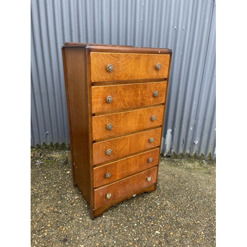 1 - An oak tallboy chest of six drawers 60x40x110