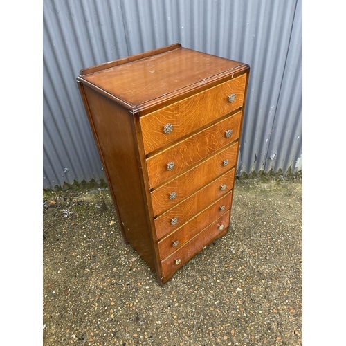 1 - An oak tallboy chest of six drawers 60x40x110