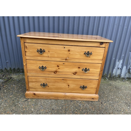 100 - A solid pine chest of three drawers 97x47x 80