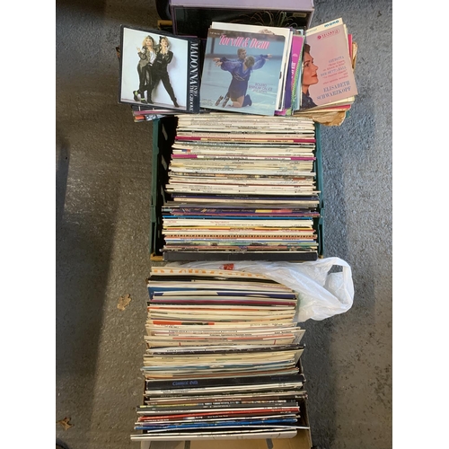 1052 - Two boxes of assorted LP's and collection of single records