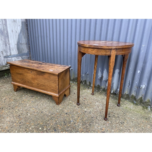 106 - Small oak coffer 75x30x42 together with a circular occasional table