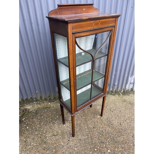 107 - An Edwardian inlaid cabinet 62x30x140