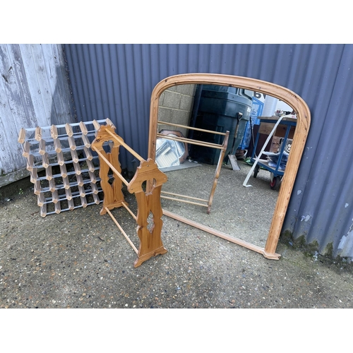 109 - A large pine overmantel together with a pine airer and a wine rack