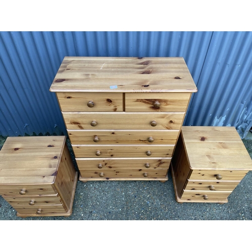 125 - A PINE TALLBOY CHEST OF SEVEN TOGETHER WITH MATCHING BEDSIDES