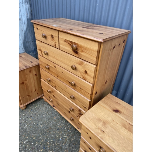 125 - A PINE TALLBOY CHEST OF SEVEN TOGETHER WITH MATCHING BEDSIDES