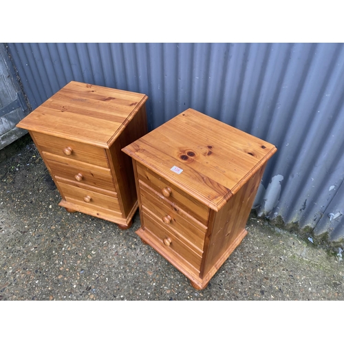 126 - A pair of solid pine three drawer bedsides