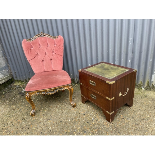 127 - A military style two drawer side table together with an Italian style chair