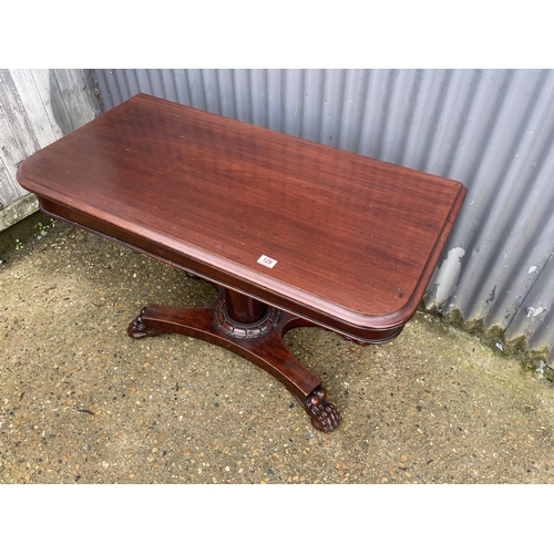 129 - A large victorian mahogany fold over tea table