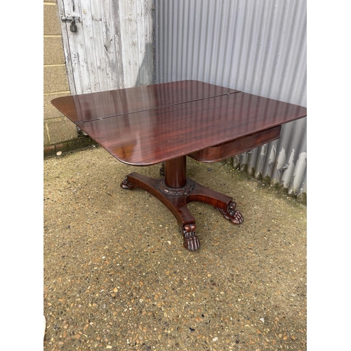 129 - A large victorian mahogany fold over tea table