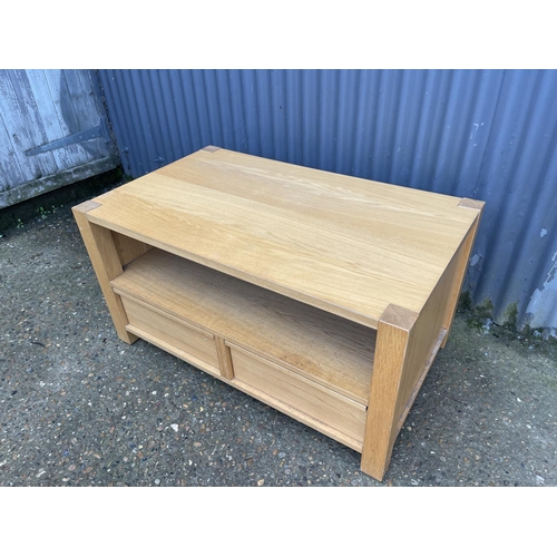 130 - A modern light oak two drawer coffee table 100x 60x50