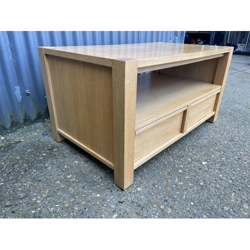 130 - A modern light oak two drawer coffee table 100x 60x50