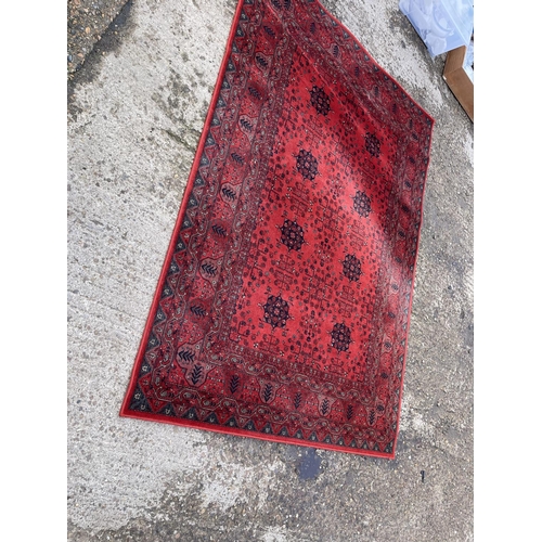 133 - A red pattern rug 175x240