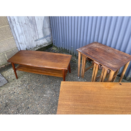 143 - two mid century teak coffee tables together with a teak nest AF