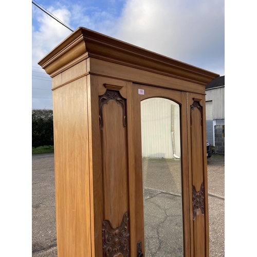 150 - An Edwardian satinwood single door wardrobe 96x54x204