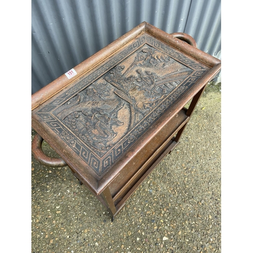 151 - An oriental hardwood three tier trolley