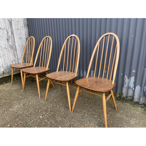 158 - A set of four ercol light elm stick back chairs