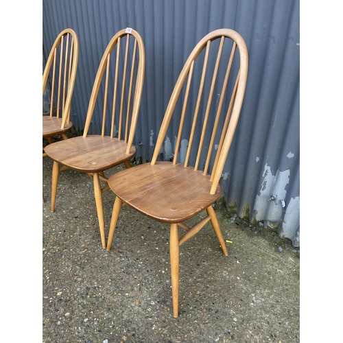 158 - A set of four ercol light elm stick back chairs