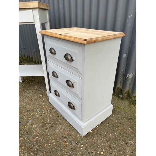 166 - A grey painted pine three drawer bedside together with a painted single drawer table