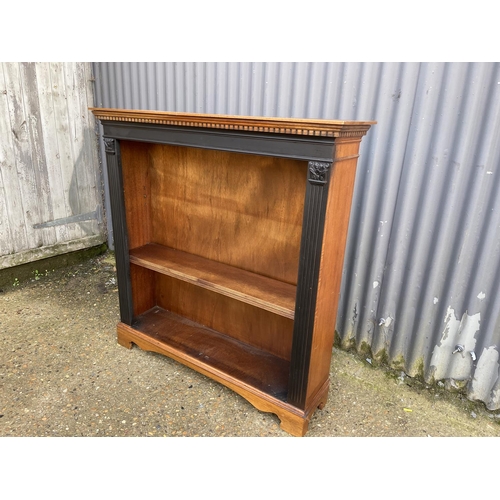 169 - An Edwardian mahogany open fronted bookcase with two shelves  105x28x108