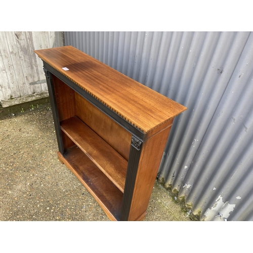 169 - An Edwardian mahogany open fronted bookcase with two shelves  105x28x108