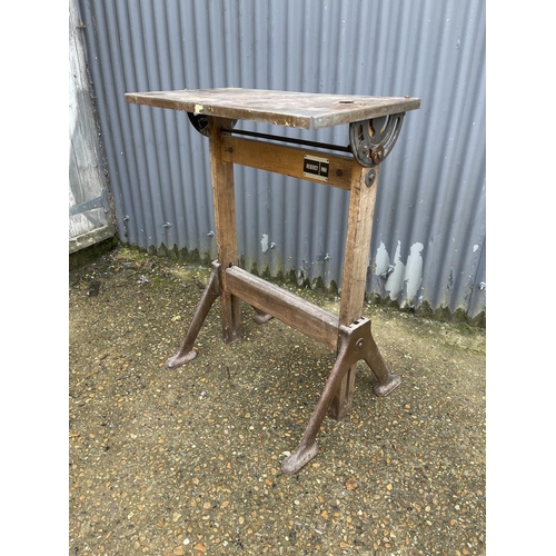 17 - A vintage iron and wooden framed artists drawing table labelled 'Regency'  ir72x40x100