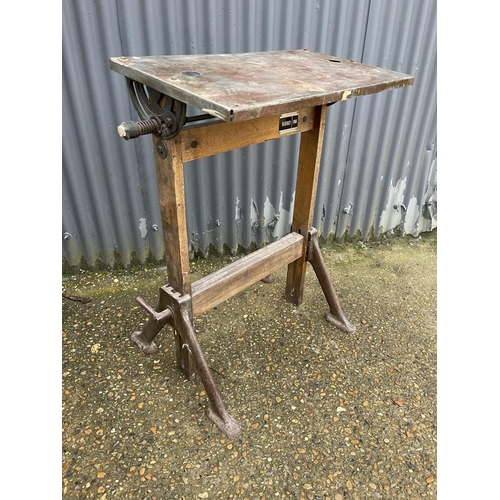 17 - A vintage iron and wooden framed artists drawing table labelled 'Regency'  ir72x40x100