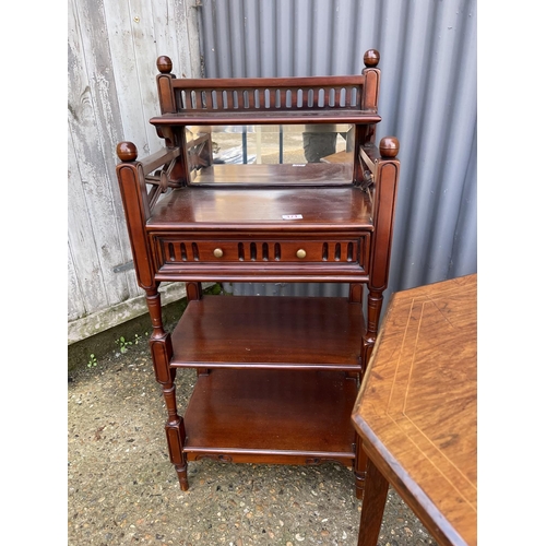 171 - A reproduction whatnot, inlaid centre table and a cake stand