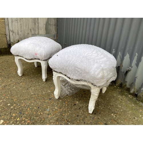 173 - A pair of french style footstools with white fluffy upholstery 45x45x40