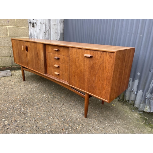 176 - A mid century g plan teak cocktail sideboard 207cm long