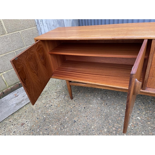 176 - A mid century g plan teak cocktail sideboard 207cm long