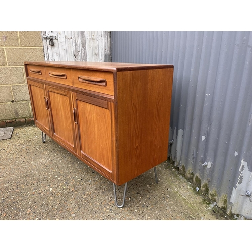 177 - A g plan fresco style teak  sideboard raised on hairpin legs 144x40x85